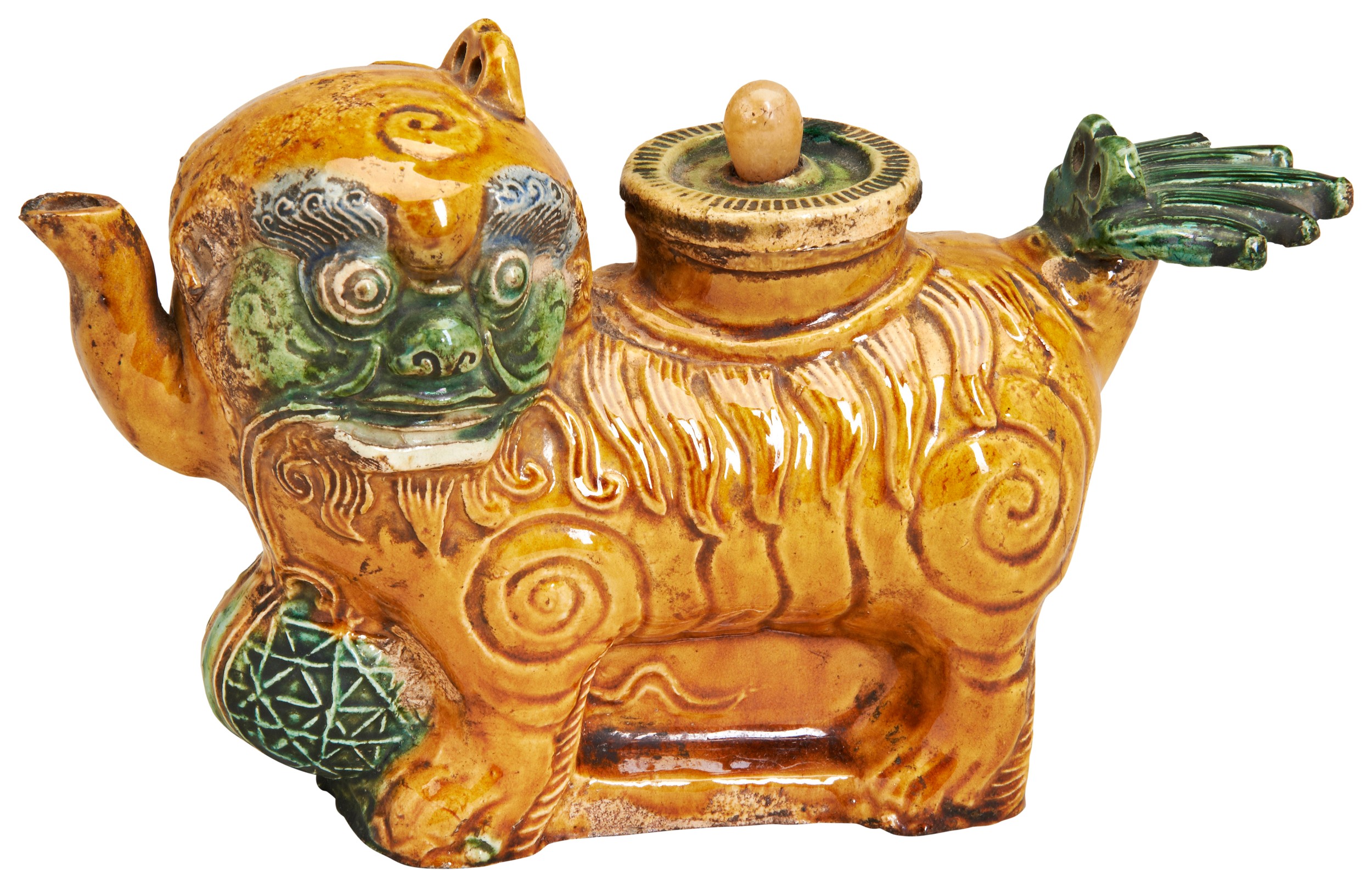 A RARE BUDDHIST LION AMBER-AND-GREEN GLAZED WINE POT KANGXI PERIOD (1662-1722) 清康熙 素三彩水丞 modelled