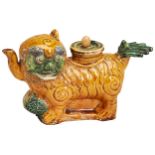 A RARE BUDDHIST LION AMBER-AND-GREEN GLAZED WINE POT KANGXI PERIOD (1662-1722) 清康熙 素三彩水丞 modelled