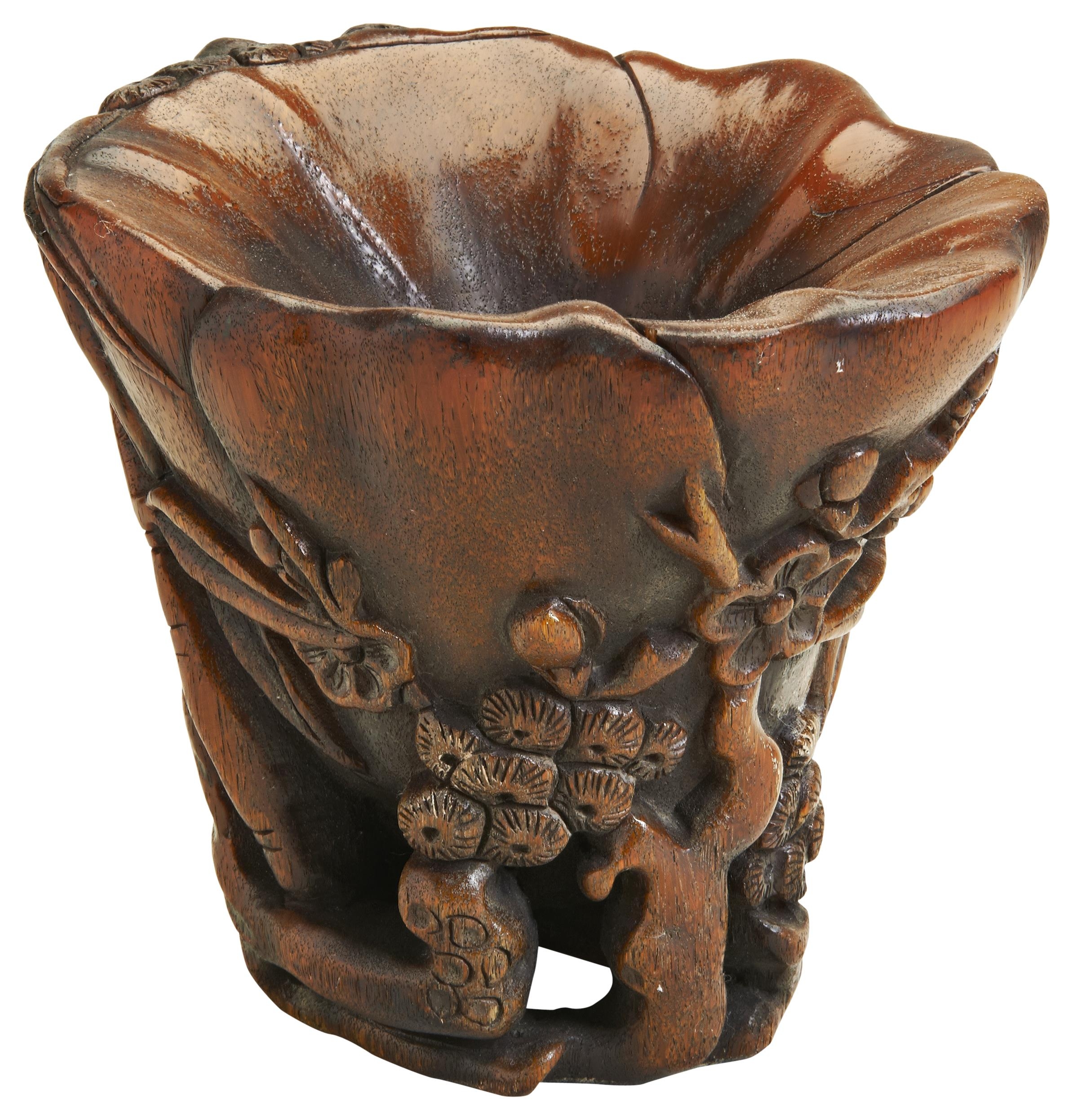 A CARVED RHINOCEROS HORN 'THREE WINTER FRIENDS' LIBATION CUP QING DYNASTY, 19TH CENTURY  清 十九世纪 “