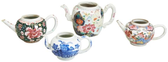 A CHINESE PORCELAIN FAMILLE ROSE BLACK GROUND TEAPOT, together with a Chinese porcelain famille rose