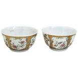 A PAIR OF FAMILLE ROSE WINE CUPS YONGZHENG PERIOD (1723-1736)  the exterior painted with