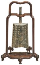 AN ARCHAIC BRONZE BELL WARRING STATES PERIOD of elliptical form the sides decorated with six rows of