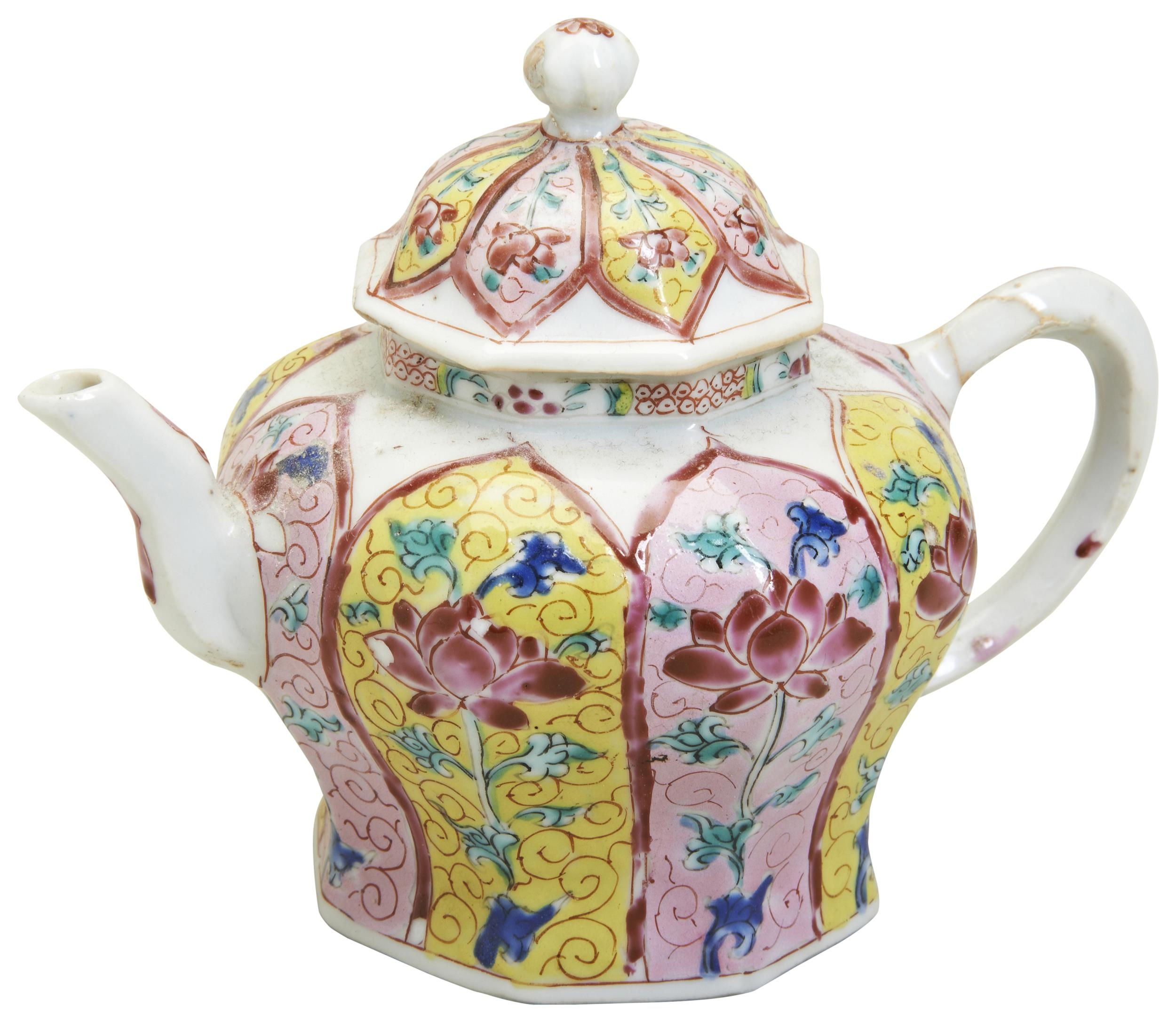 A CHINESE EXPORT FAMILLE ROSE 'LOTUS' TEAPOT YONGZHENG PERIOD (1723-1735) 11cm high PROVENANCE: From