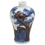 A SMALL COPPER-RED AND UNDERGLAZE-BLUE VASE, MEIPING 19TH / 20TH CENTURY painted with monkeys and