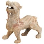A LARGE PAINTED POTTERY FIGURE OF A MYTHICAL BEAST EASTERN HAN DYNASTY (AD.25-220) modelled as a