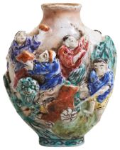 A FAMILLE ROSE MOULDED PORCELAIN SNUFF BOTTLE QING DYNASTY, 19TH CENTURY  with boys playing, bears