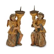 Pair of Italian Polychromed and Parcel-Gilt Carved Wood Figural Candlesticks