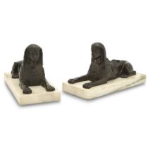 Pair of Empire Style Patinated Bronze Sphinxes on Marble Plinths