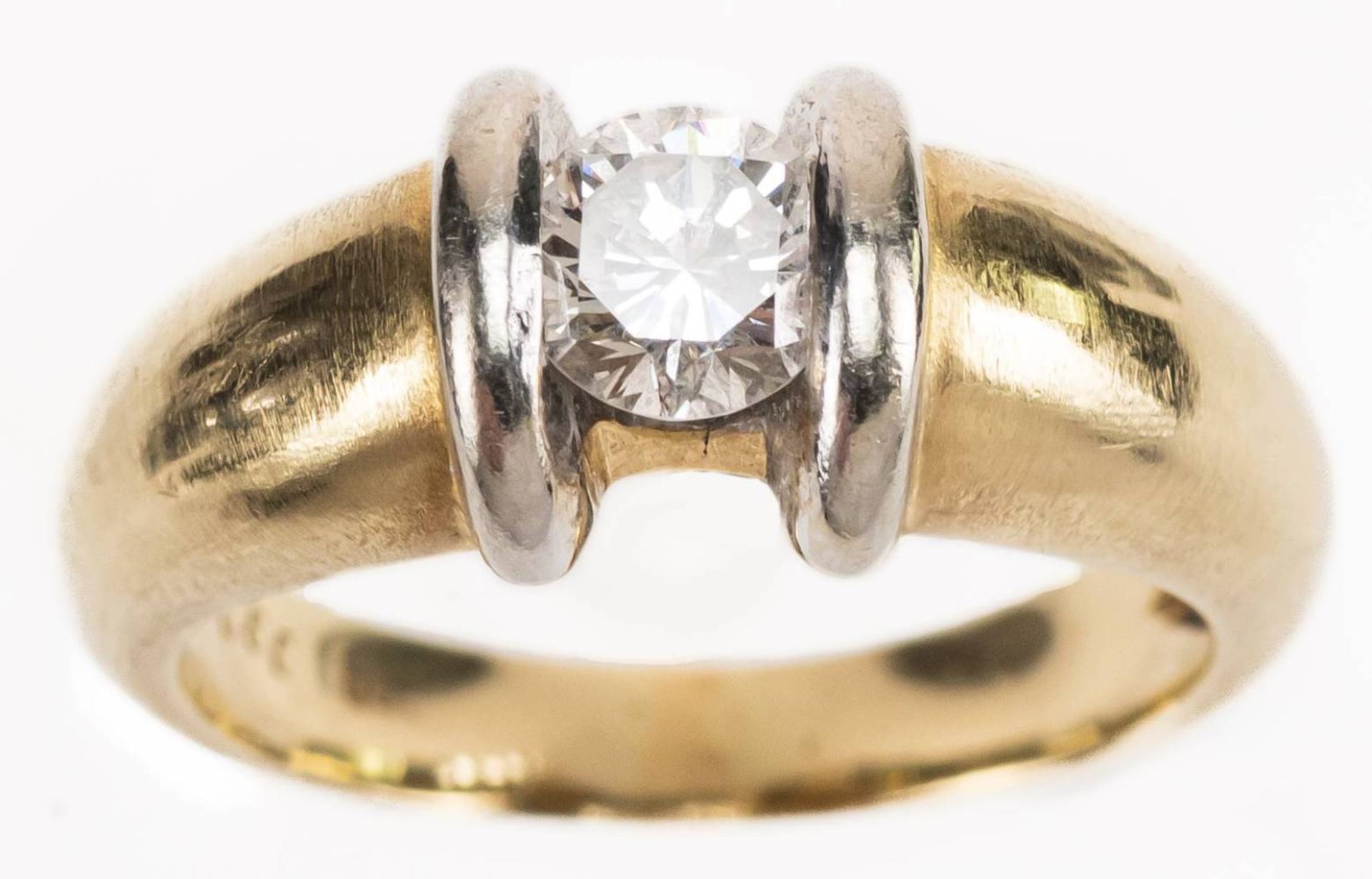 Brillant Ring, 585 Gold, bicolor, Brillant ca. 0,6ct, RW 54, ca. 6,99g.