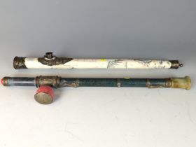 Hardstone and white metal detailed opium pipe 43cm long. Together with a bone and white metal decora