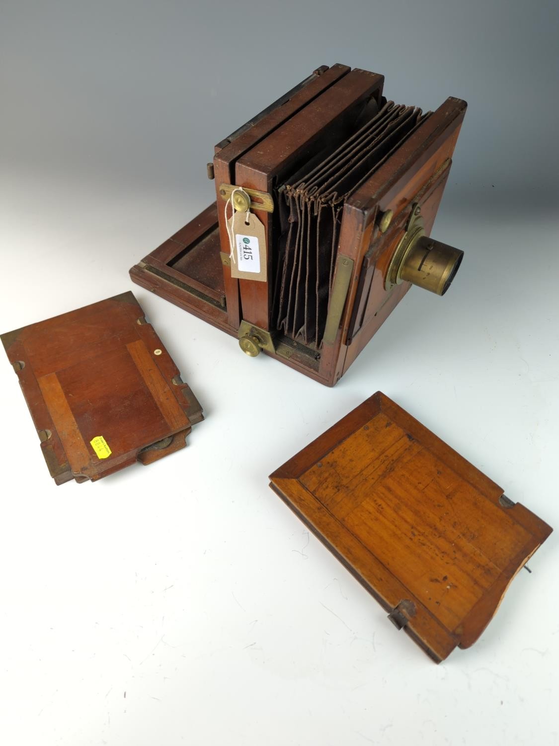 Wood encased plate camera dating to 1884 with brass f9 4.5mm lens and other brass furniture with two - Image 3 of 8