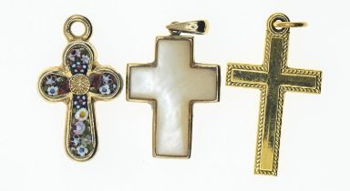 9ct gold cross set with mother-of-pearl, gross weight 2.48 grams, together with two gold plated cros