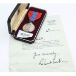 ERII Imperial Service Medal in case of issue with ribbon and letter signed Vice Admiral Sir Robert G