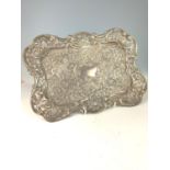 Late Victorian silver dressing table tray, maker's mark MJ., Birmingham 1900, with embossed foliate 