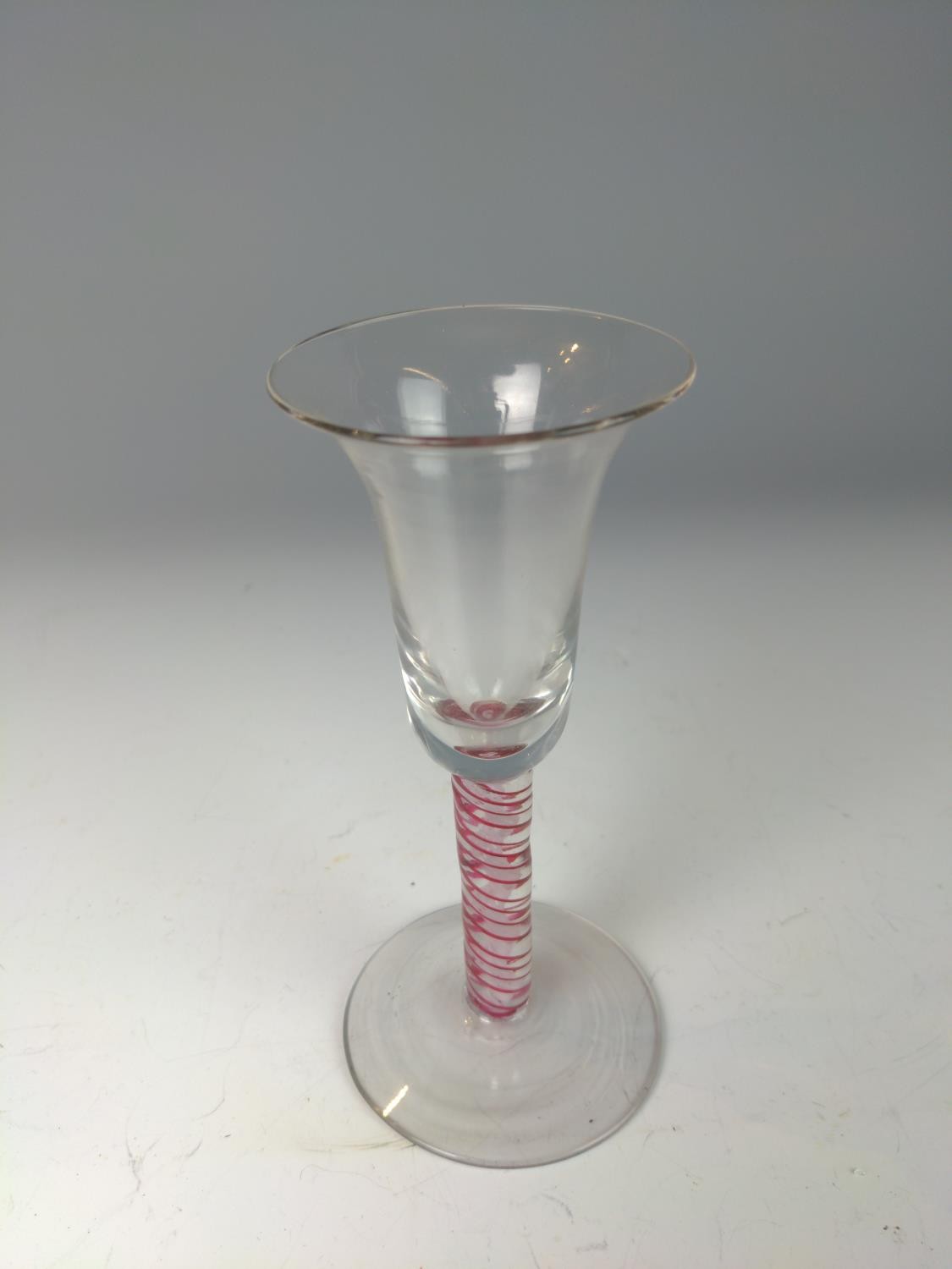 Opaque and red twist stem wine glass, probably Dutch, with bell-shaped bowl, on a conical foot, heig - Image 2 of 4
