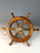 Ships wheel barometer with G.P.O. stamped in centre of dial Dia 40.5cm