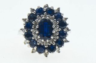 18ct white gold, sapphire and diamond triple row cluster ring