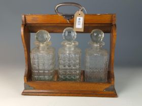 3 decanter tantalus with key, decanters are replacements W35 D14 H34cm 