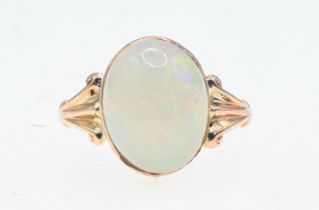 9ct gold ring set with a large oval cabochon opal (13.7mm x 10.7mm estimated). Size P/Q Gross weight