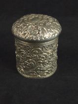 Late Victorian silver tea caddy, Mitchell Bosley & Co, Birmingham 1899, with embossed floral and scr