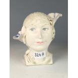 Ceramic bust of a 1920s style lady. 16cm high.  