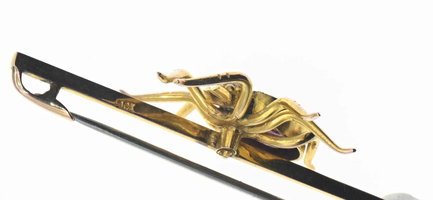 9ct gold mounted spider bar brooch. Body set with a purple paste stone and seed pearl. Gross weight  - Image 3 of 3