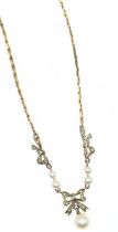 9ct gold, pearl and diamond bow necklace, circumference 405mm, gross weight 5.53 grams