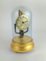 Bulle type electric torsion 800 day mantle clock with glass dome on wooden base, height to top of do