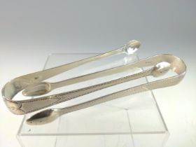 Two pairs of George III silver sugar nips, including: a pair hallmarked IB, London 1793; and the oth