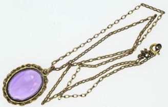 Oval mixed cut amethyst measuring approximately, 20mm x 15mm with a 9ct gold chain. Length 420mm. Gr