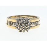 9ct gold and diamond cluster ring with split shoulder design, size J 1/2, gross weight 3.80g. 
