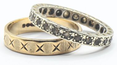 Two 9ct gold rings, including an eternity ring set with white stones and the other with a continuous