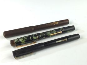 Three fountain pens, all with 14ct gold nibs inc. a Green marbled 'The Croxley', a 'Blackbird Self F