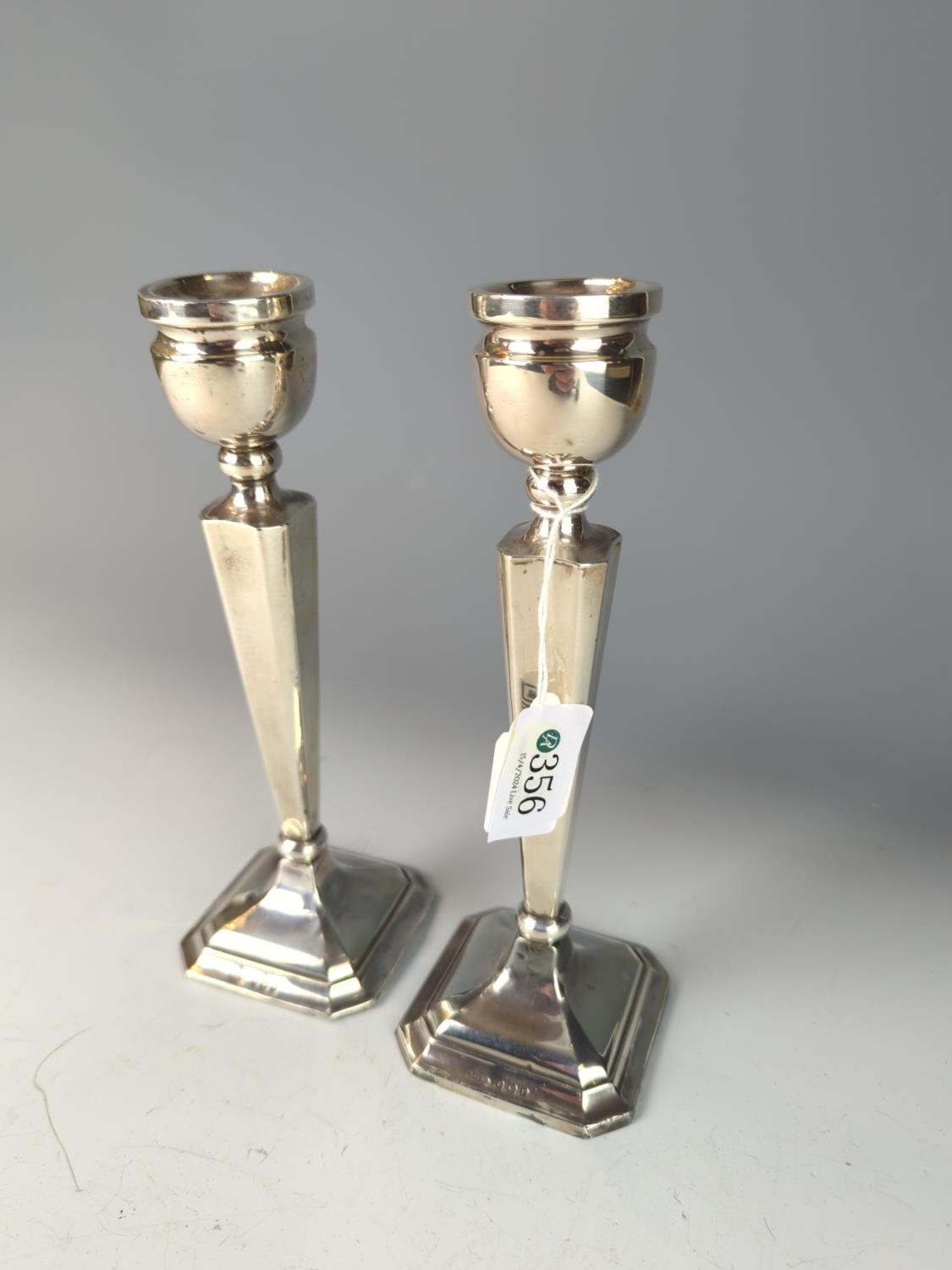 Pair of silver candlesticks, Britton, Gould & Co, Birmingham 1939, each with urn-shaped nozzles, tap - Image 3 of 3
