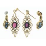 Two pairs of 9ct gold earrings. One set with sapphire CZ and one with garnets. Gross weight 4.1g 