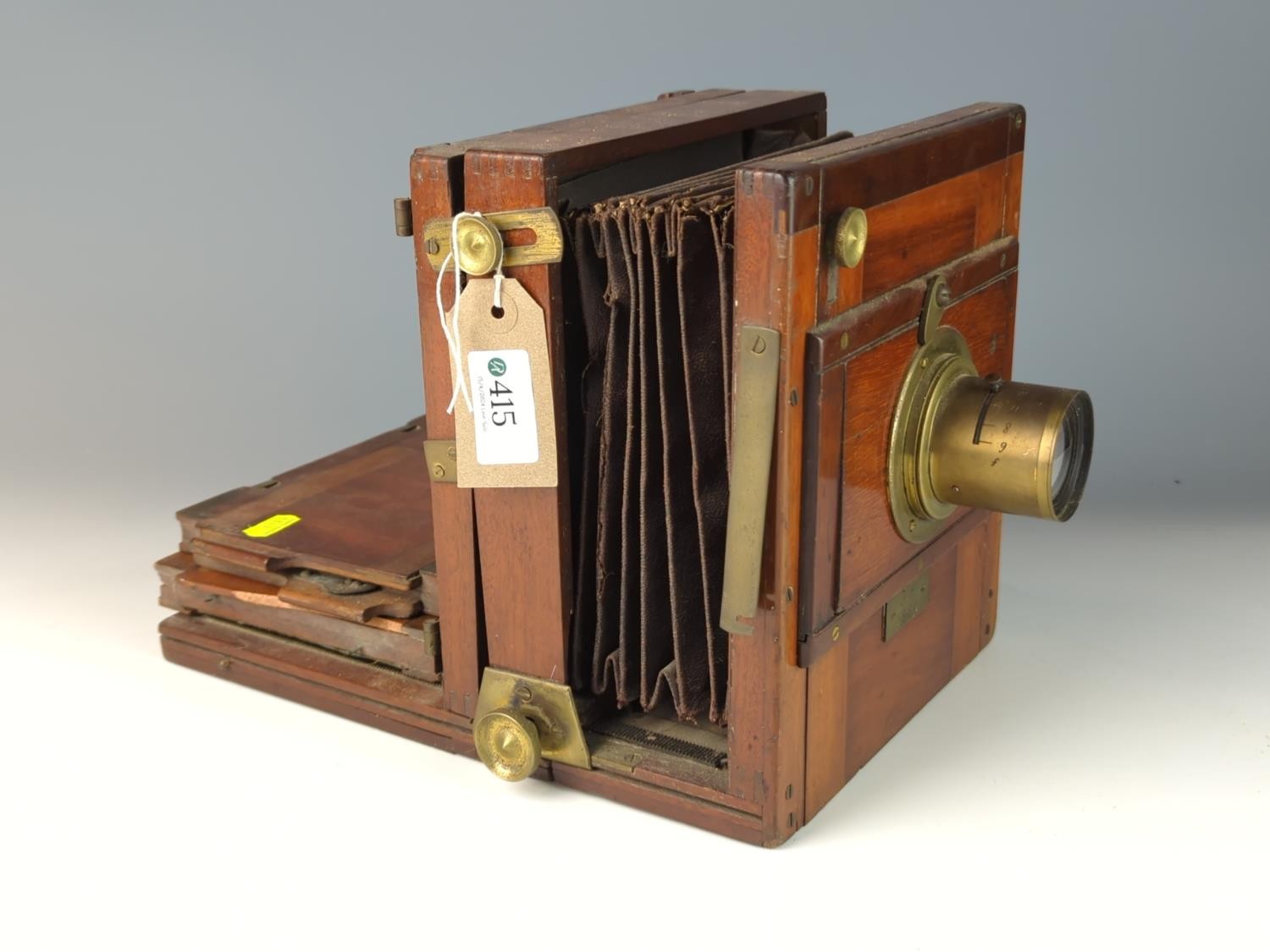 Wood encased plate camera dating to 1884 with brass f9 4.5mm lens and other brass furniture with two - Image 2 of 8