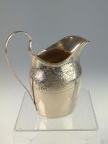 Victorian silver cream jug, Walter & John Barnard, London 1892, with bright-cut decoration and empty