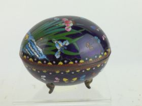 Japanese Ginbari cloisonne egg shaped box on feet,  decorated with irises on a purple ground, L95 x