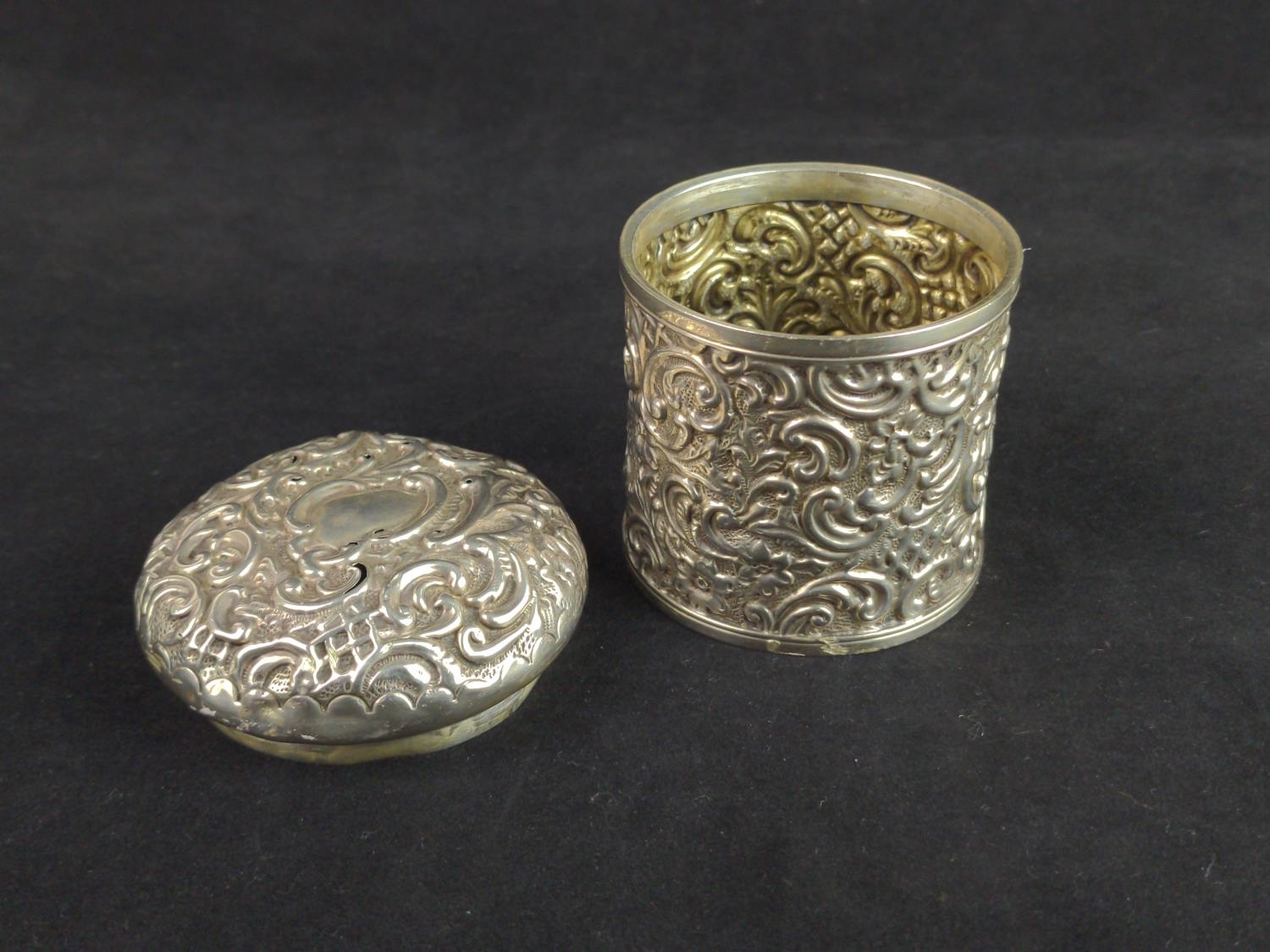 Late Victorian silver tea caddy, Mitchell Bosley & Co, Birmingham 1899, with embossed floral and scr - Image 2 of 3