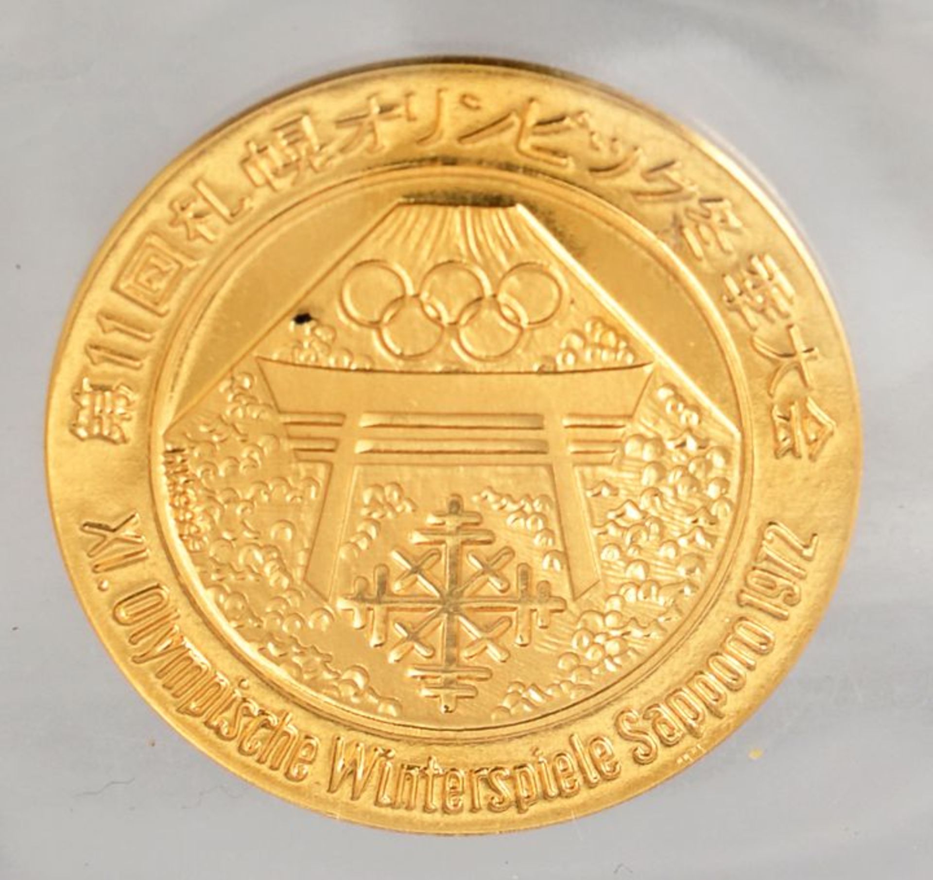 Medaille Gold/ gold medal
