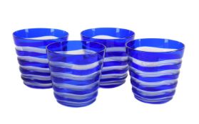 CARL ROTTER, LUBECK, A SET OF FOUR GERMAN CLEAR AND BLUE CASED GLASS TUMBLERS