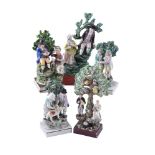 FIVE VARIOUS STAFFORDSHIRE PEARLWARE FIGURAL BOCAGE GROUPS