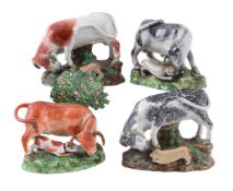 FOUR VARIOUS STAFFORDSHIRE PEARLWARE 'BULL-BAITING' GROUPS