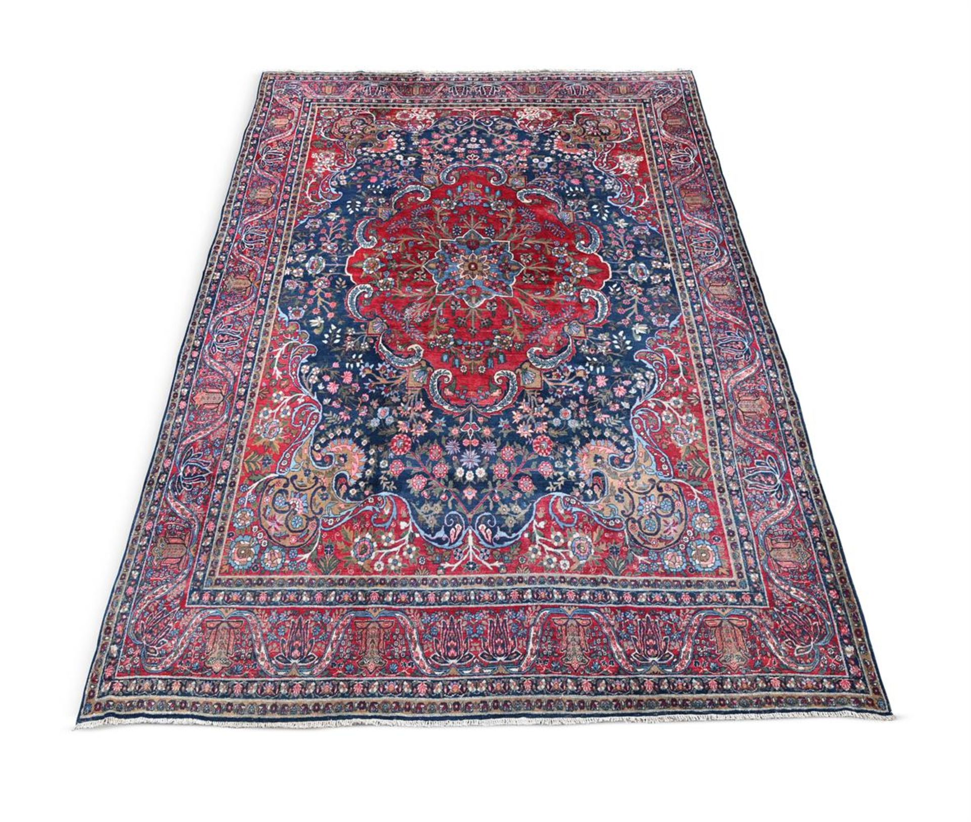 A KIRMAN CARPET