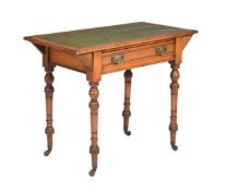 A VICTORIAN MAHOGANY AND LEATHER TOPPED WRITING TABLE