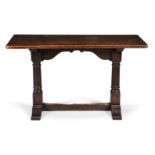 A CARVED OAK TAVERN TABLE