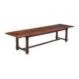 AN OAK AND FRUIT WOOD DINING TABLE