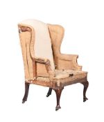 A MAHOGANY WING ARMCHAIR IN GEORGE III STYLE