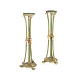 A PAIR OF GREEN PAINTED AND PARCEL GILT TORCHERE STANDS IN GEORGE III STYLE