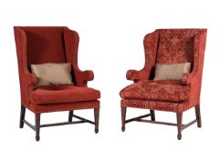 A PAIR OF MAHOGANY WING ARMCHAIRS